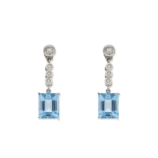 Pendientes Blue Moon en Oro Blanco 18K con Diamantes y Topacio Azul