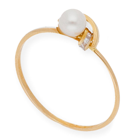 Anillo con perla cultivada y circonita en oro 18k