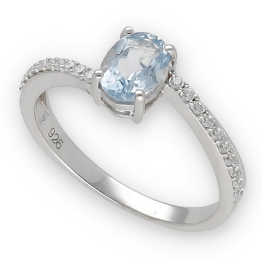 Anillo Dyna de Plata con Topacio Azul Ovalado Central y Circonitas