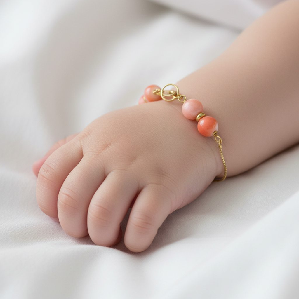 Pulsera de bebé en oro 18k con corales naturales