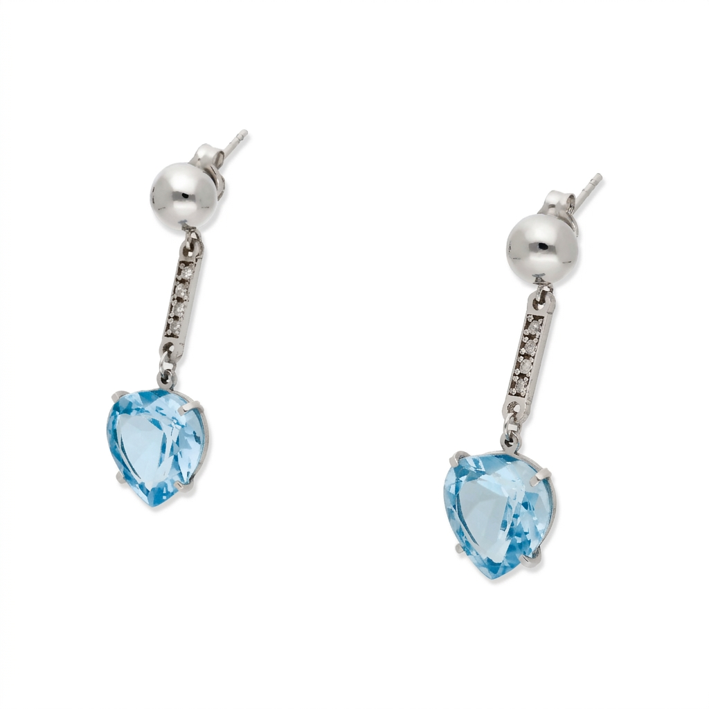 Pendientes Jerte en Oro Blanco 18K con Diamantes y Corazón de Topacio Azul