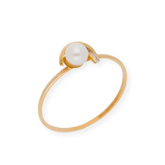 Anillo con perla cultivada y circonita en oro 18k