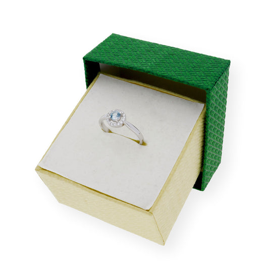 Anillo de Plata con Topacio Azul Central y Circonitas