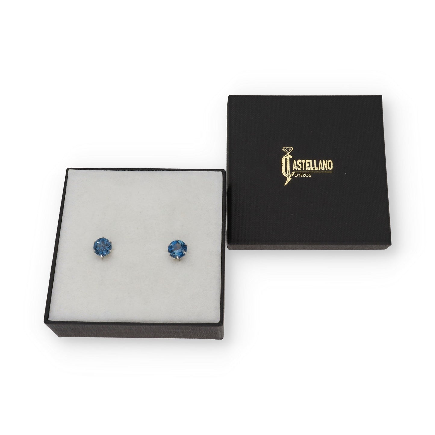 Pendientes Deep en Oro Blanco 18K con Topacio Azul en 6 Garras